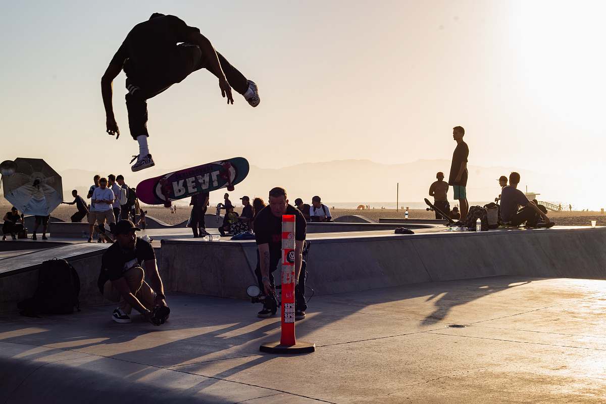 venice skate park person performing trick on skateboard los angeles